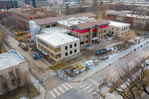 Aerial photograph of a construction site on a cold, winter day.